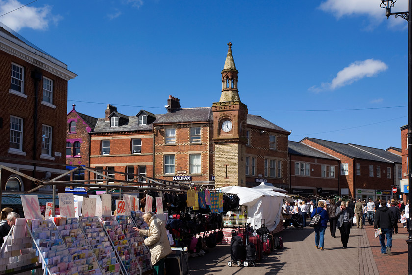 DCP1558 
 Ormskirk town centre on market day 
 Keywords: Ormskirk, town, centre, market, day, stall, clock, tower, Lancashire, Lancs, Northwest, North, West, England, UK, Britian, Europe, commerce, business, tade, trading, DCP1558