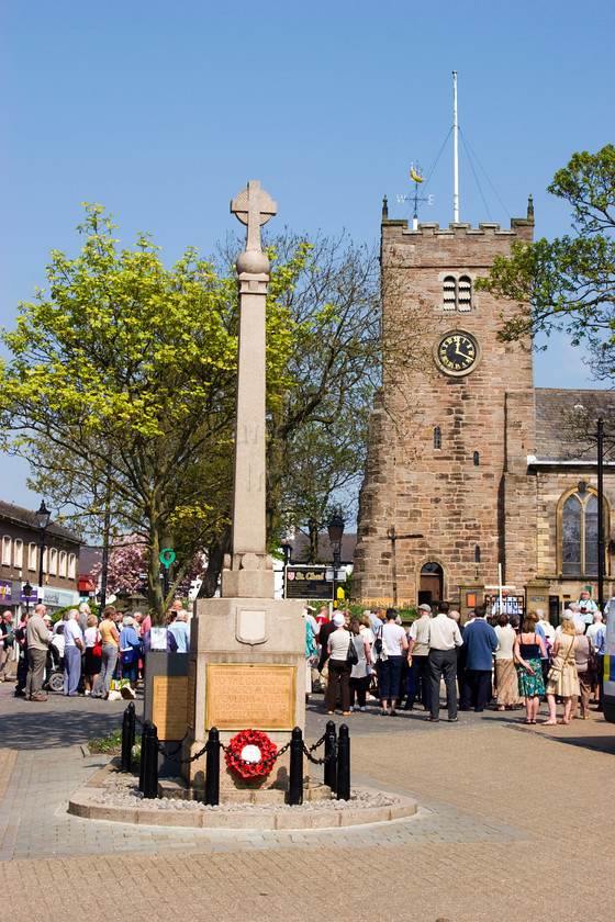 DCP2001 
 Easter service in front of St Chads parish church in Poulton le Fylde 
 Keywords: Poulton, Easter, service, St, Chad, war, memorial, crowd, people, religion, religious, clock, tower, cross, blue, sky, Lancashire, Lancs, England, UK, Britain, Europe, DCP2001