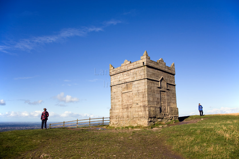 DCP2119 
 Folly on top of Rivington Pike, Lancashire 
 Keywords: Rivington, Pike, folly, two, people, stone, tower, blue, sky, country, park, Lancashire, Lancs, England, UK, Britain, Europe, DCP2119
