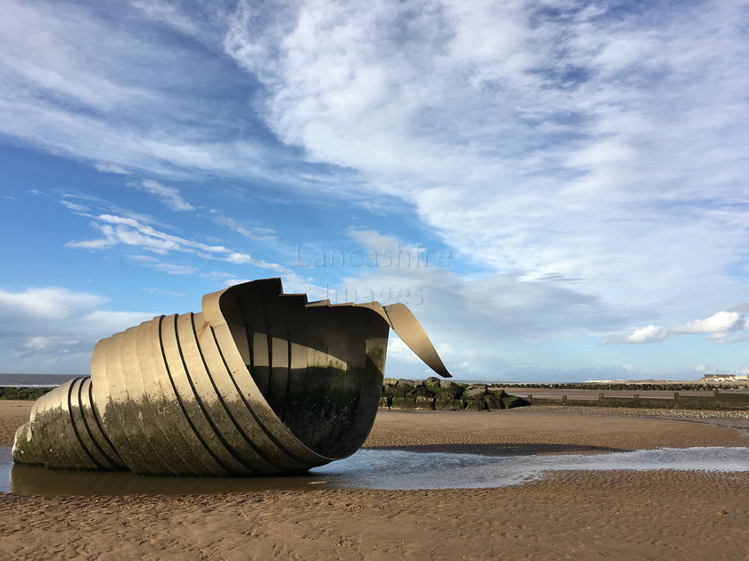 image 
 Mary's Shell sculpture on Cleveleys beach 
 Keywords: Cleveleys, sculpture, beach
