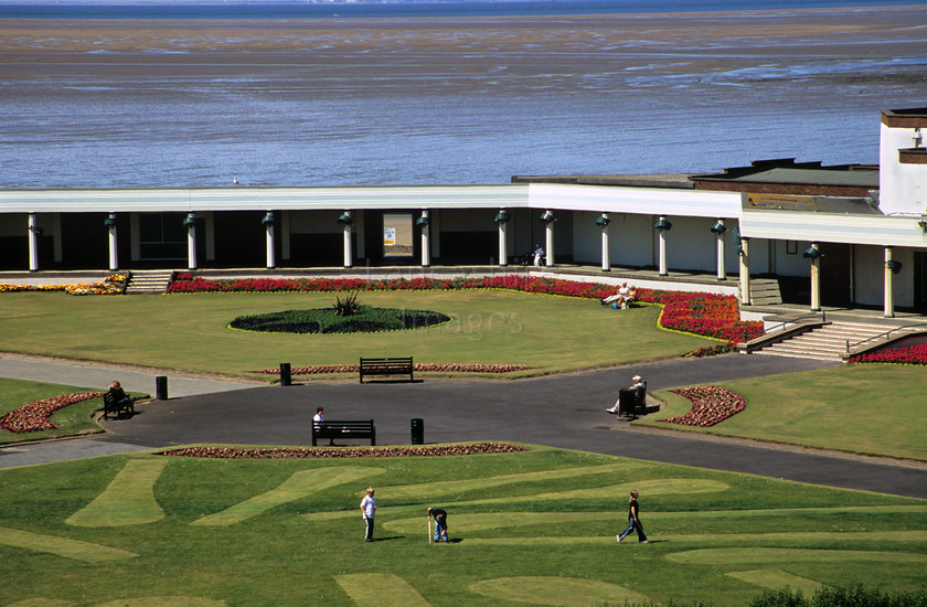 DCP0572 
 Putting and bowling greens on the seafront by the Dome Theatre in Fleetwood 
 Keywords: Lancashire, Lancs, North, West, Northwest, England, UK, Britain, Europe, Fleetwood, Town, Centre, Fylde, Coast, Seaside, Resort, put, putting, bowl, bowling, green, sport, game, recreation, leisure, pavilion, theatre, entertain, entertainment, low, tide, sand, sea, water, cover, covered, walk, walkway, flower, bed, park, garden, municipal, public, architecture, people, play, playing, estuary, Wyre, formal, pillar, column, horizontal