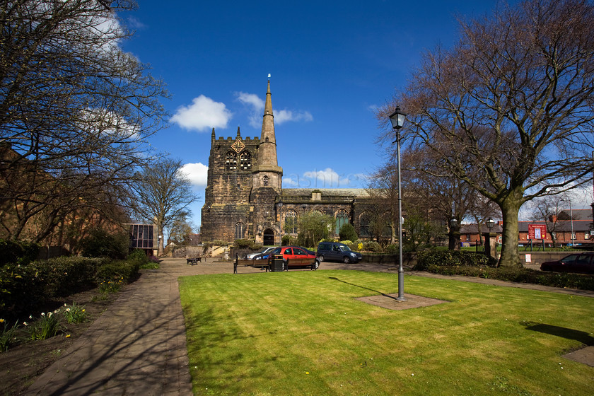 DCP1552 
 Ormskirk Parish Church of St Peter and St Paul 
 Keywords: Ormskirk, parish, church, Lancashire, Lancs, Northwest, North, West, England, UK, Britian, Europe, tower, spire, architecture, religion, religeous, building, landmark, path, green, grass, DCP1552
